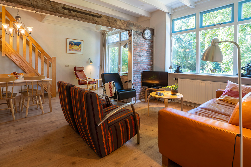 6 personen appartement Hermelijn groepsaccommodatie vakantie woonkamer vakantiewoning vakantiehuisje